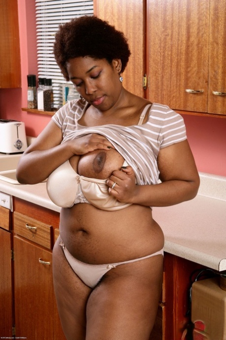 African Helping Mom hot photo